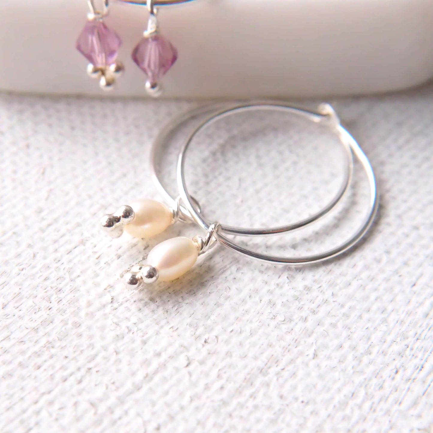 Pearl Hoop Wedding Earrings with creamy white freshwater pearl on a thin wire hook. June birthstone. Handmade in Scotland by maram jewellery.