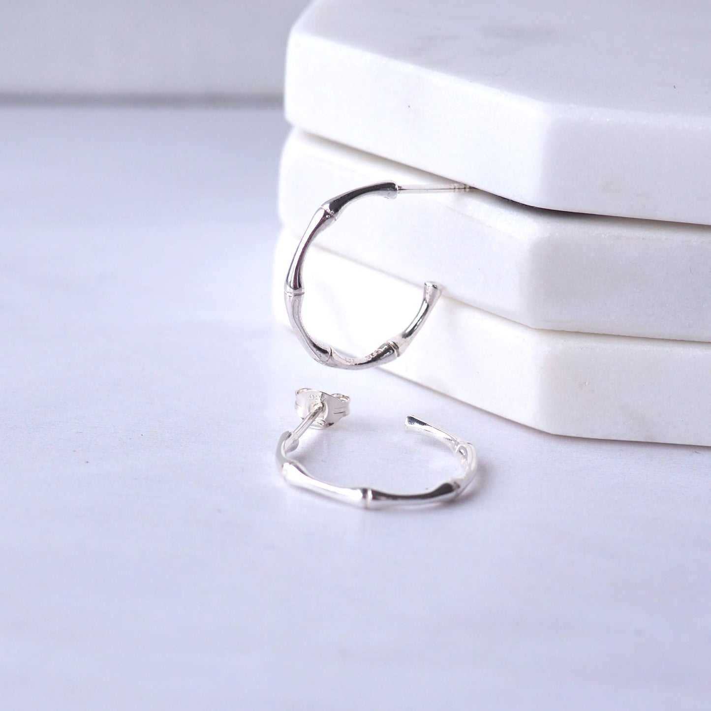 Silver Nature inspired Hoop Earrings with a bamboo texture . Shipped by maram jewellery in Scotland UK