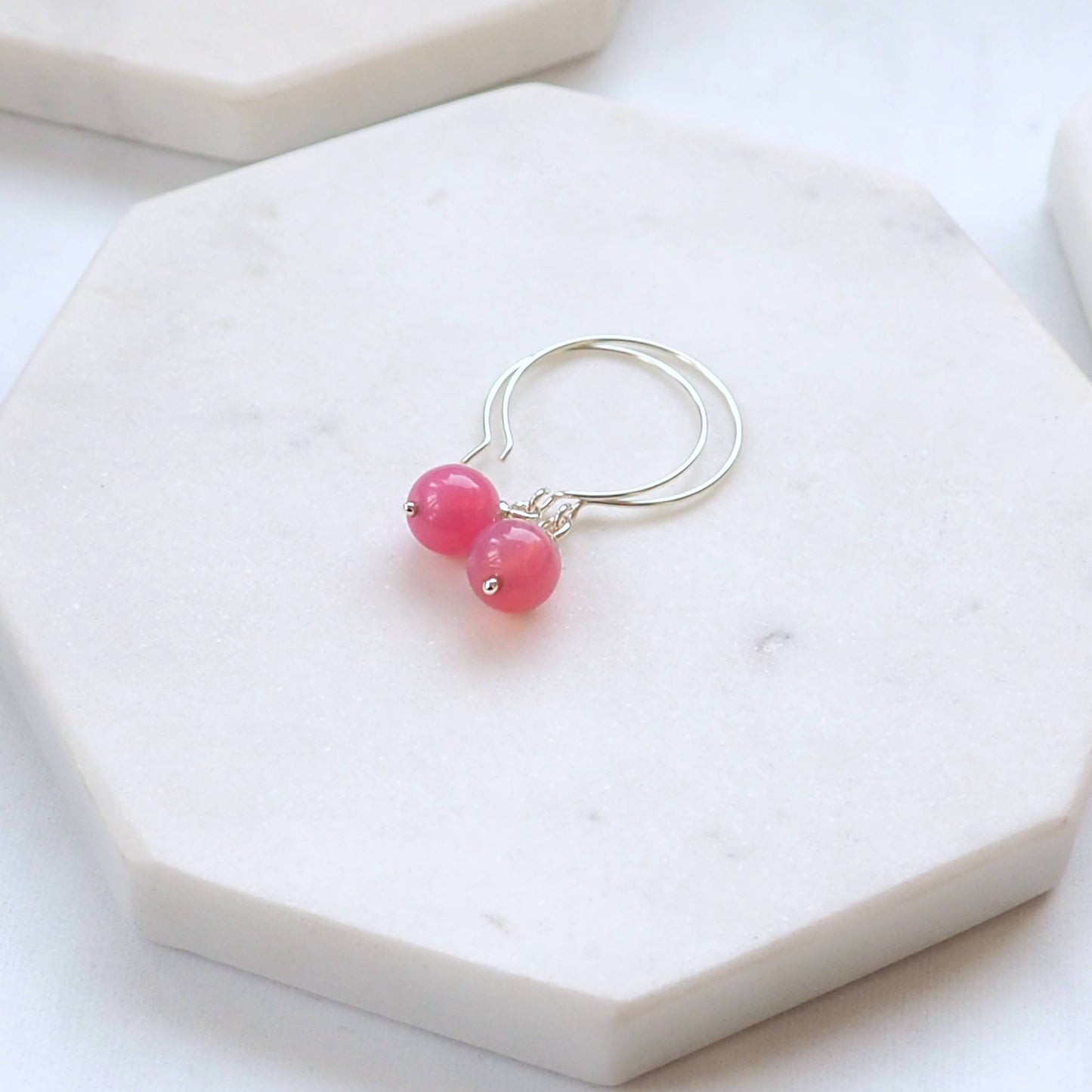 Pale Pink Silver minimalist handmade silver hoops. Handcrafted ear wires with a round glass bead dropper. Made in Scotland by maram jewellery
