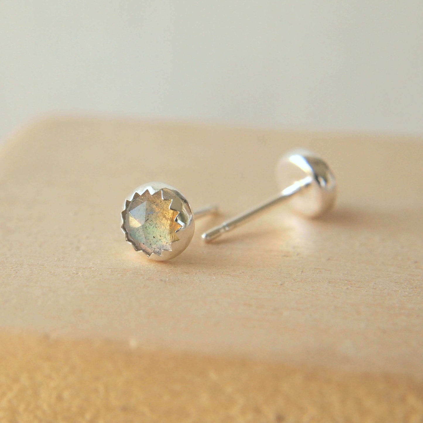 Sterling Silver and Labradorite gemstone earrings with a pair of facet cut labradorite hand crafted by maram jewellery in Scotland UK