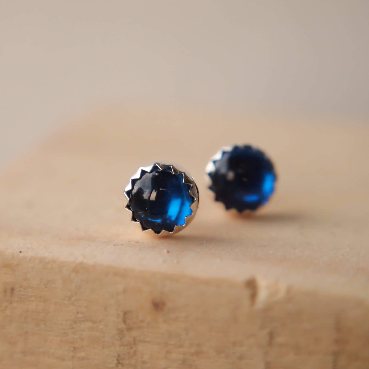 Blue Sapphire and Silver modern gemstone Earrings. Sterling Silver simple design with a pair of round 5mm lab sapphire gemstone creating ethical birthstone jewellery, and a perfect September birthstone jewellery gift. Handcrafted in Scotland UK by a small designer Jeweller, maram jewellery