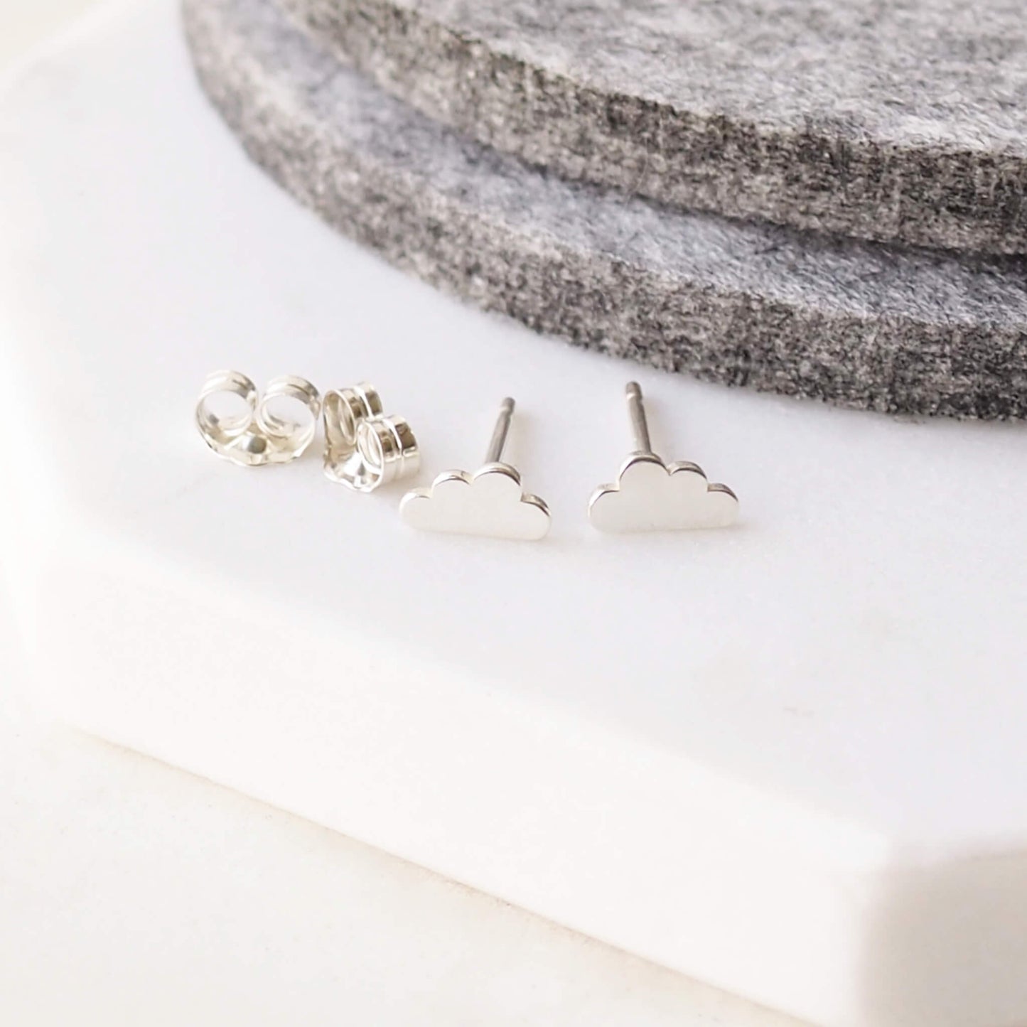 Little cloud earrings in Sterling Silver pictured with butterfly back. available at maram jewellery, a small indie jeweller in Edinburgh UK