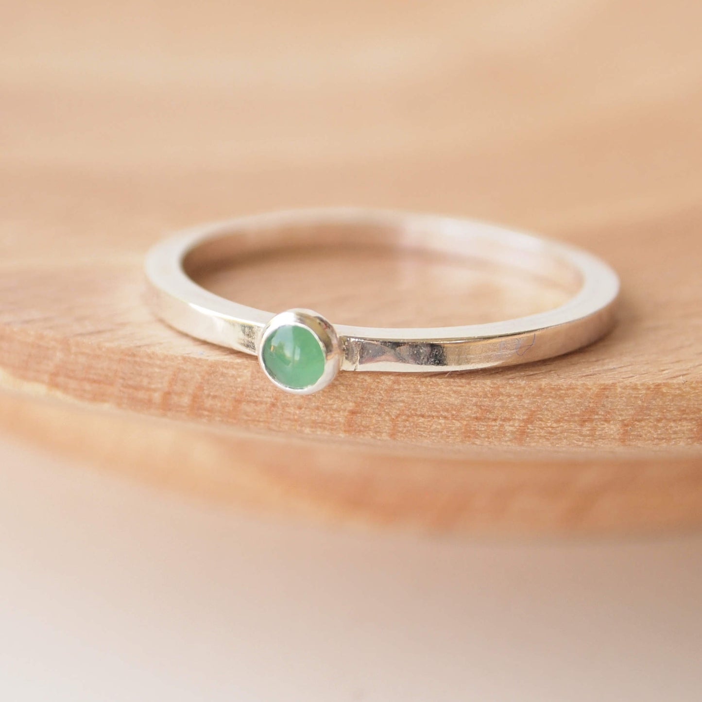 Emerald and Sterling Silver Gemstone ring with a round 3mm cabochon in Emerald, Birthstone for May. Handmade in Scotland by maram jewellery