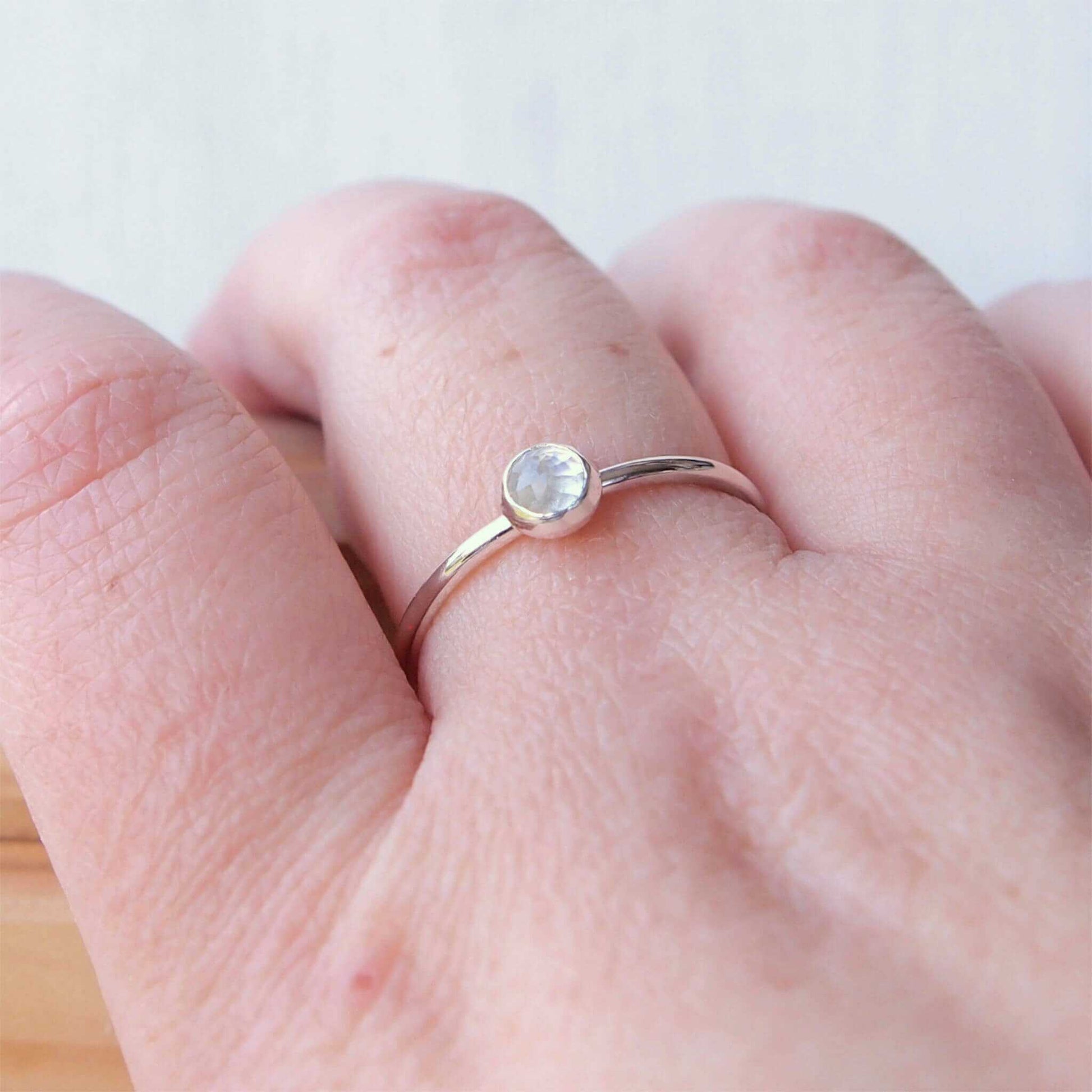 White Topaz and Sterling Silver simple minimalist ring with a 5mm round clear facet cut White Topaz, Birthstone for April. Handmade in Scotland by maram jewellery