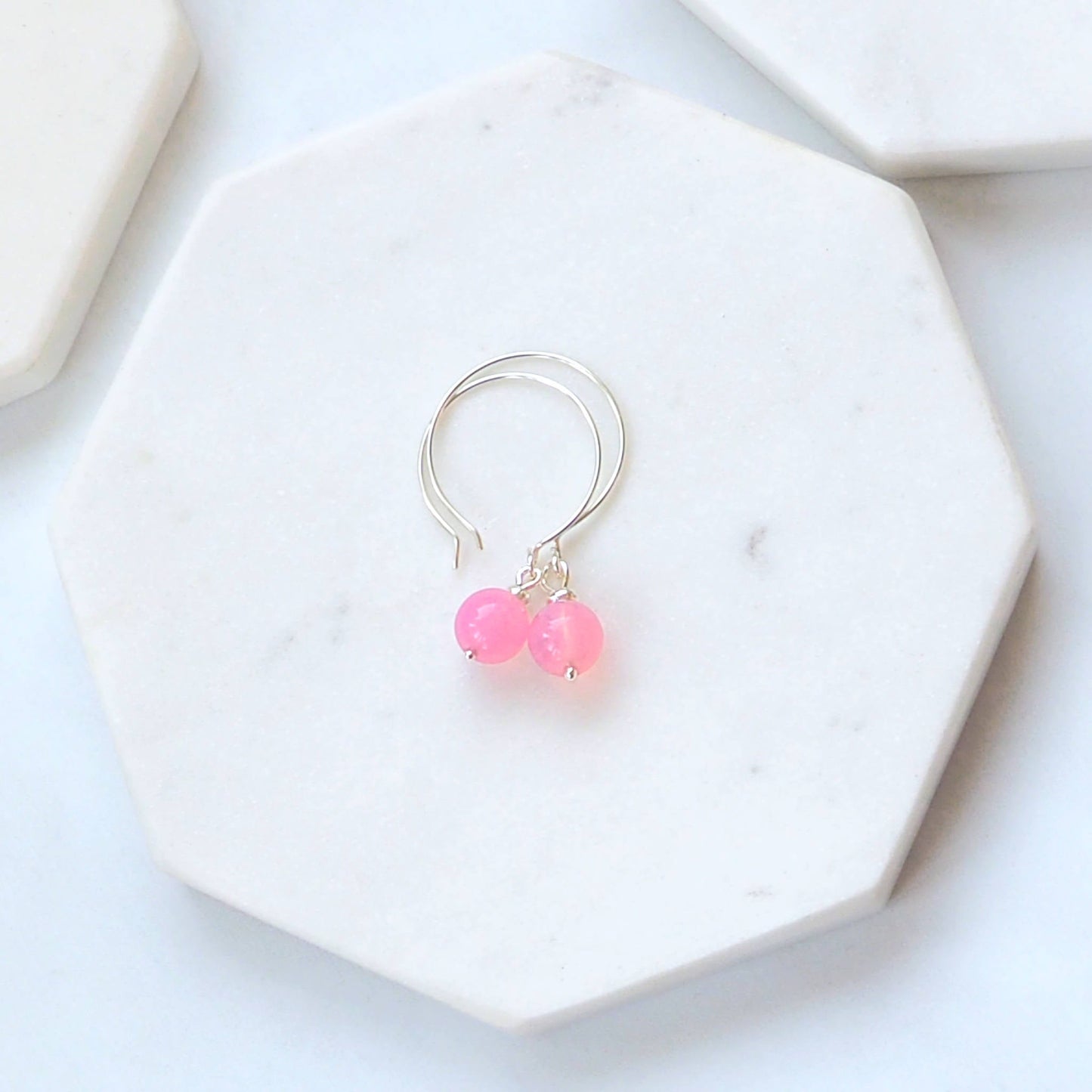 Pale Pink Silver minimalist handmade silver hoops. Handcrafted ear wires with a round glass bead dropper. Made in Scotland by maram jewellery