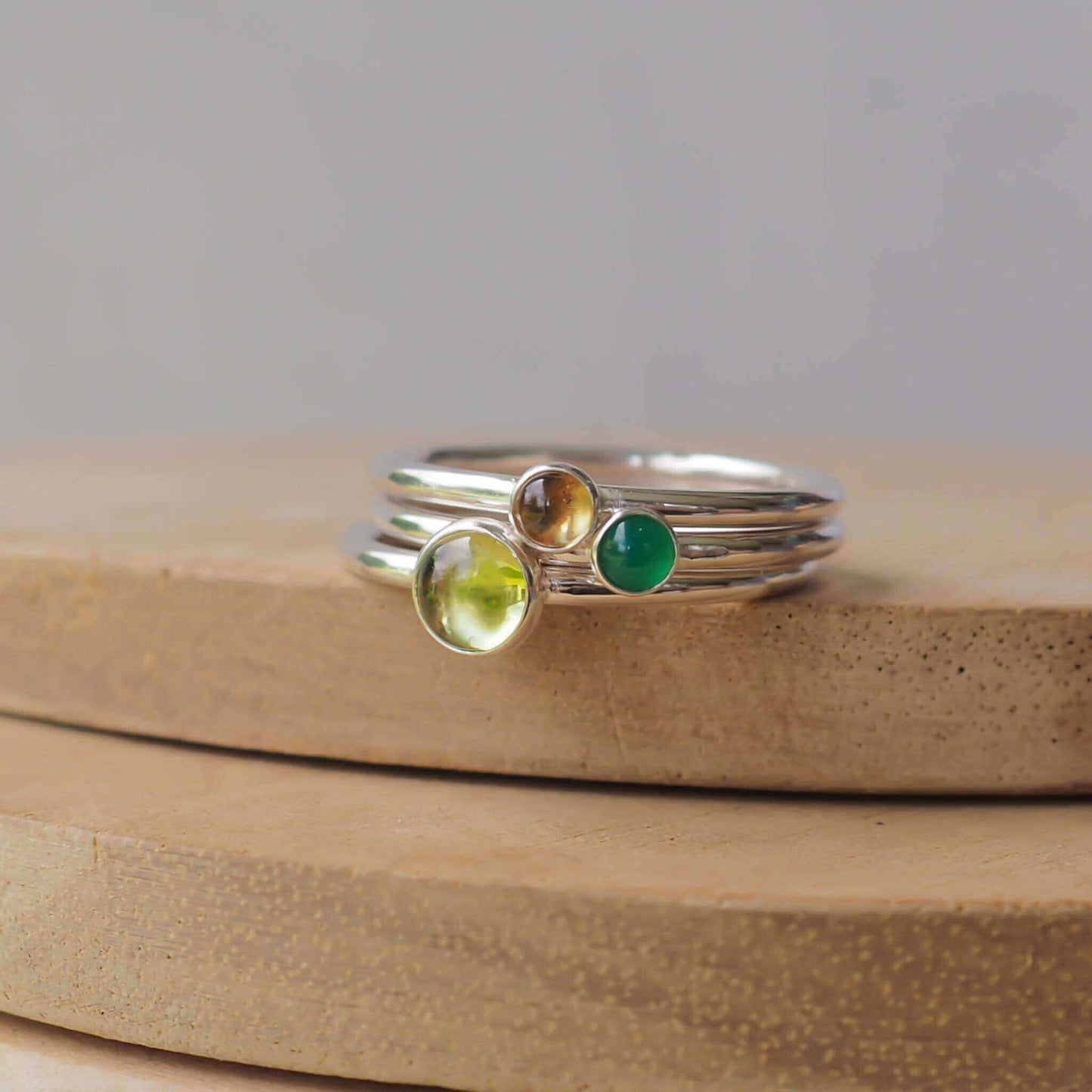 Three Birthstone Ring set made from Sterling Silver, each with a different birthstone in 5mm and 3mm size. This set has a large 5mm round Peridot with a smaller 3mm Citrine and Green Agate. Birthstones for August, May and November. Handmade in Scotland by Maram Jewellery