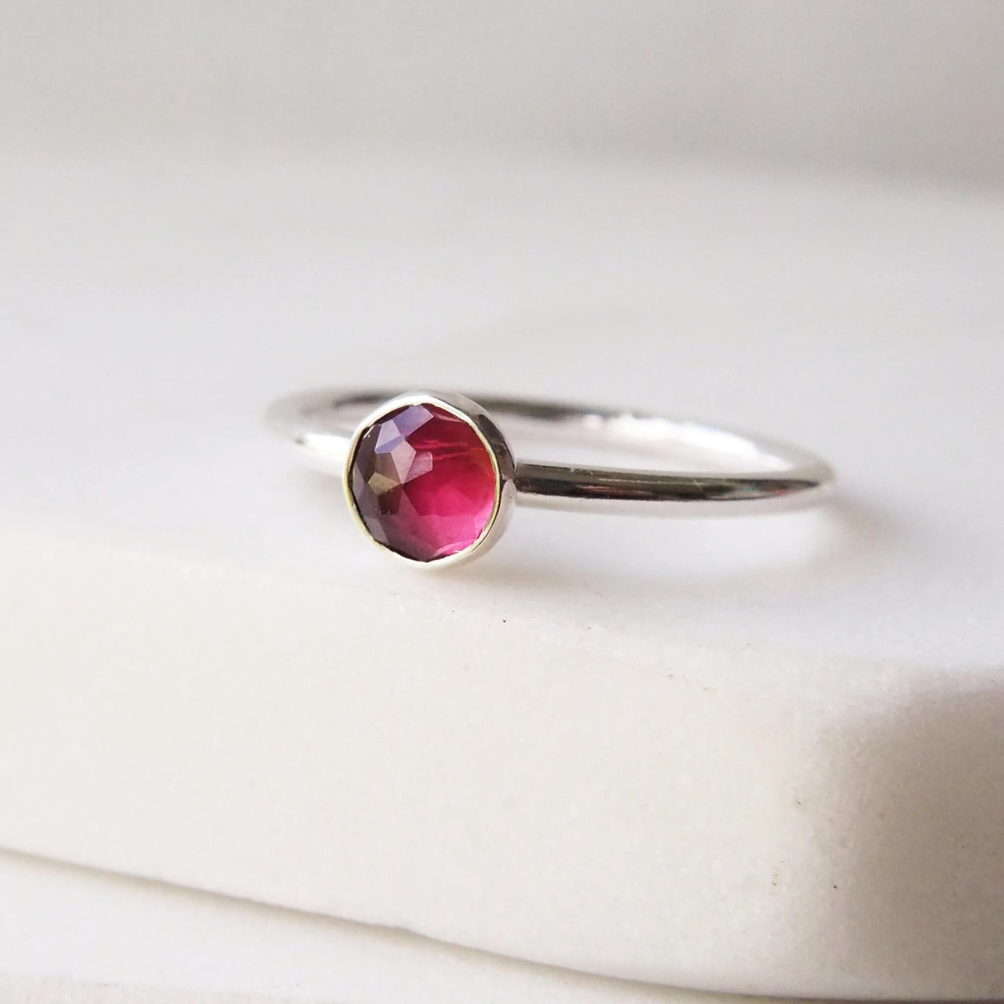 Garnet Gemstone ring, birthstone for January. A 5mm round facet cut rhodolite Garnet simple solitaire handmade ring. Handcrafted in Scotland UK by maram jewellery