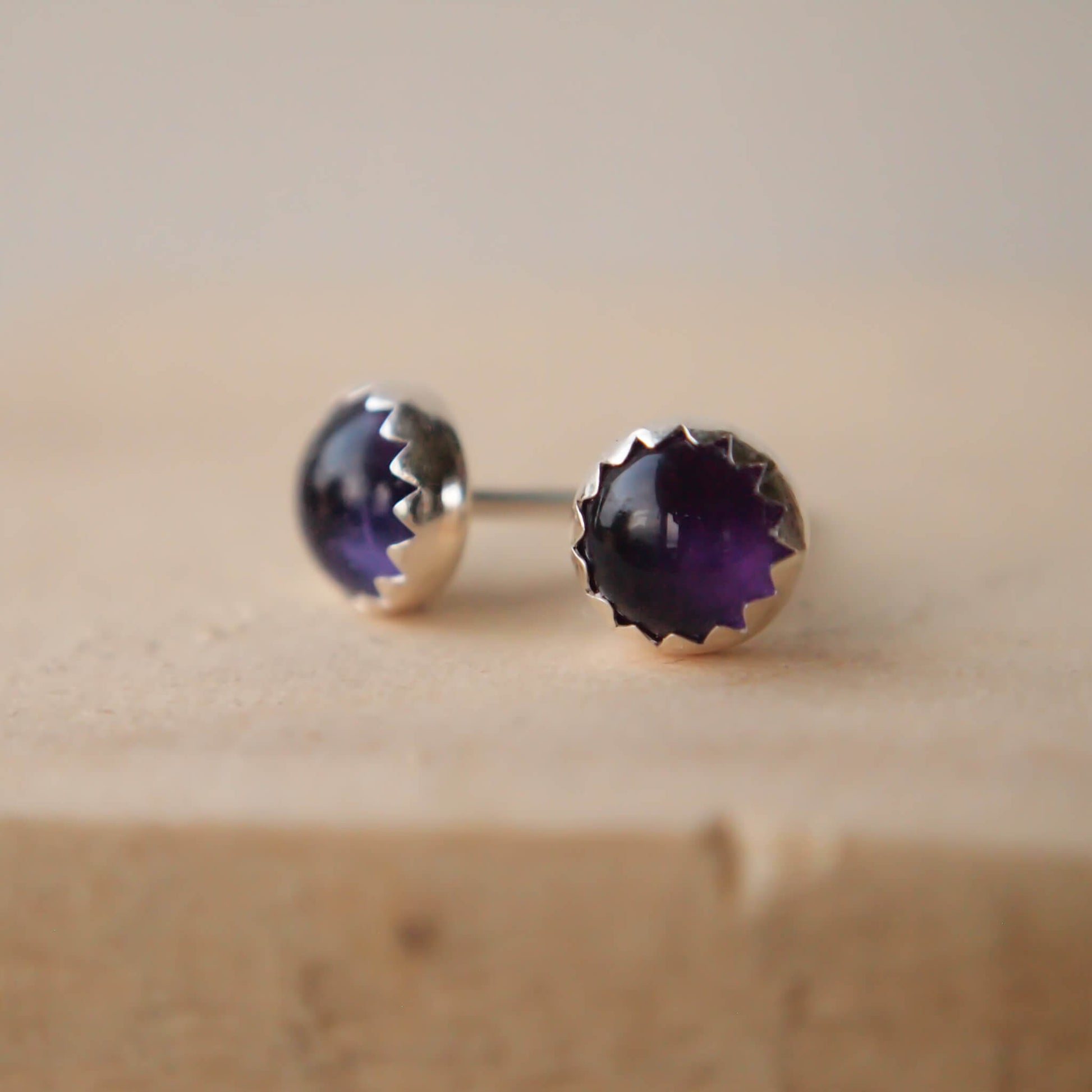 Purple Amethyst simple Silver and gemstone earrings. February Birthstones with a deep purple amethyst and a simple sterling silver setting, handmade by maram jewellery in Edinburgh Scotland UK