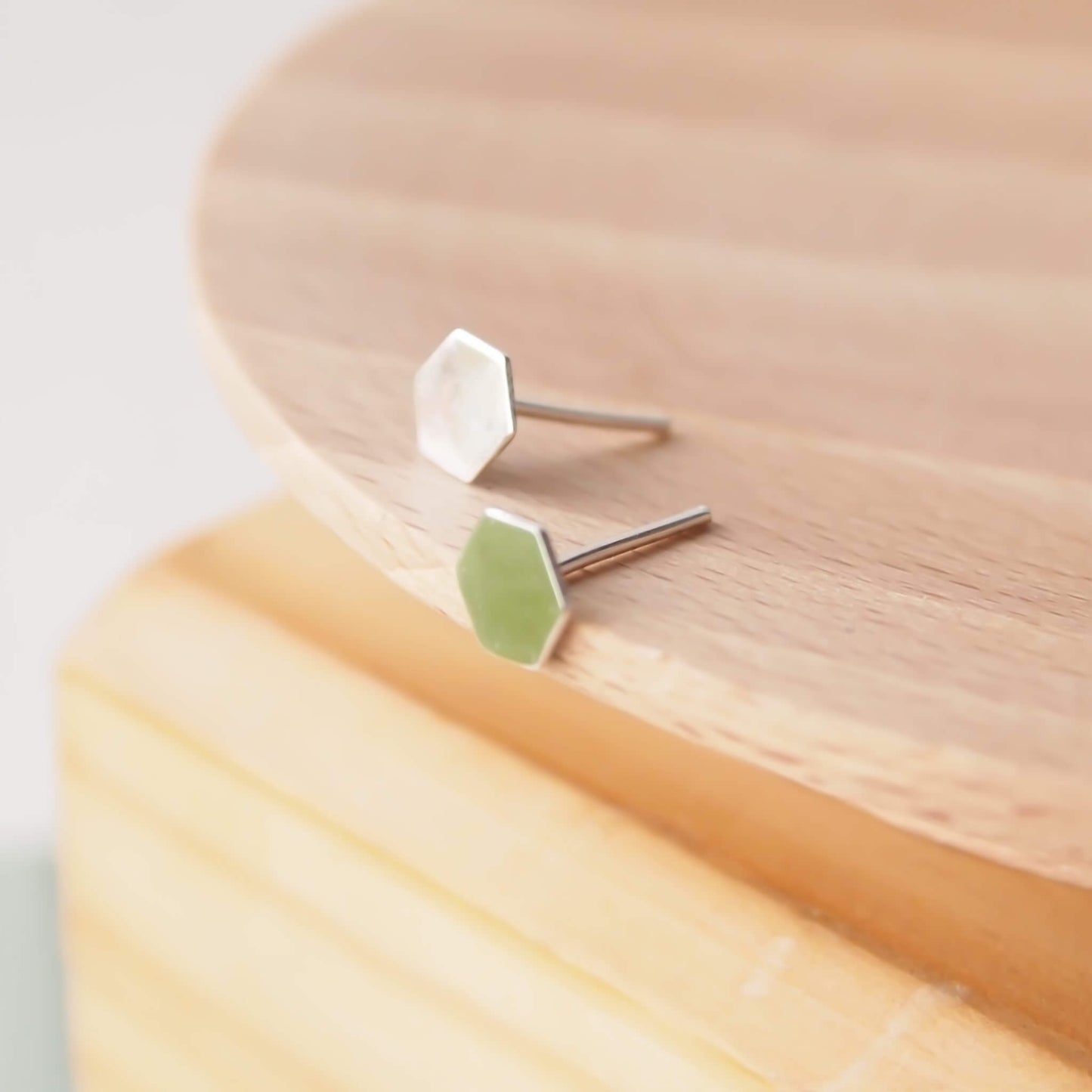 Sterling Silver small stud earrings with an hexagon design. The earrings are small and perfect for wearing in multiple piercings. The earrings are made from Sterling Silver, come with Butterfly Earring backs and are handmade by maram jewellery
