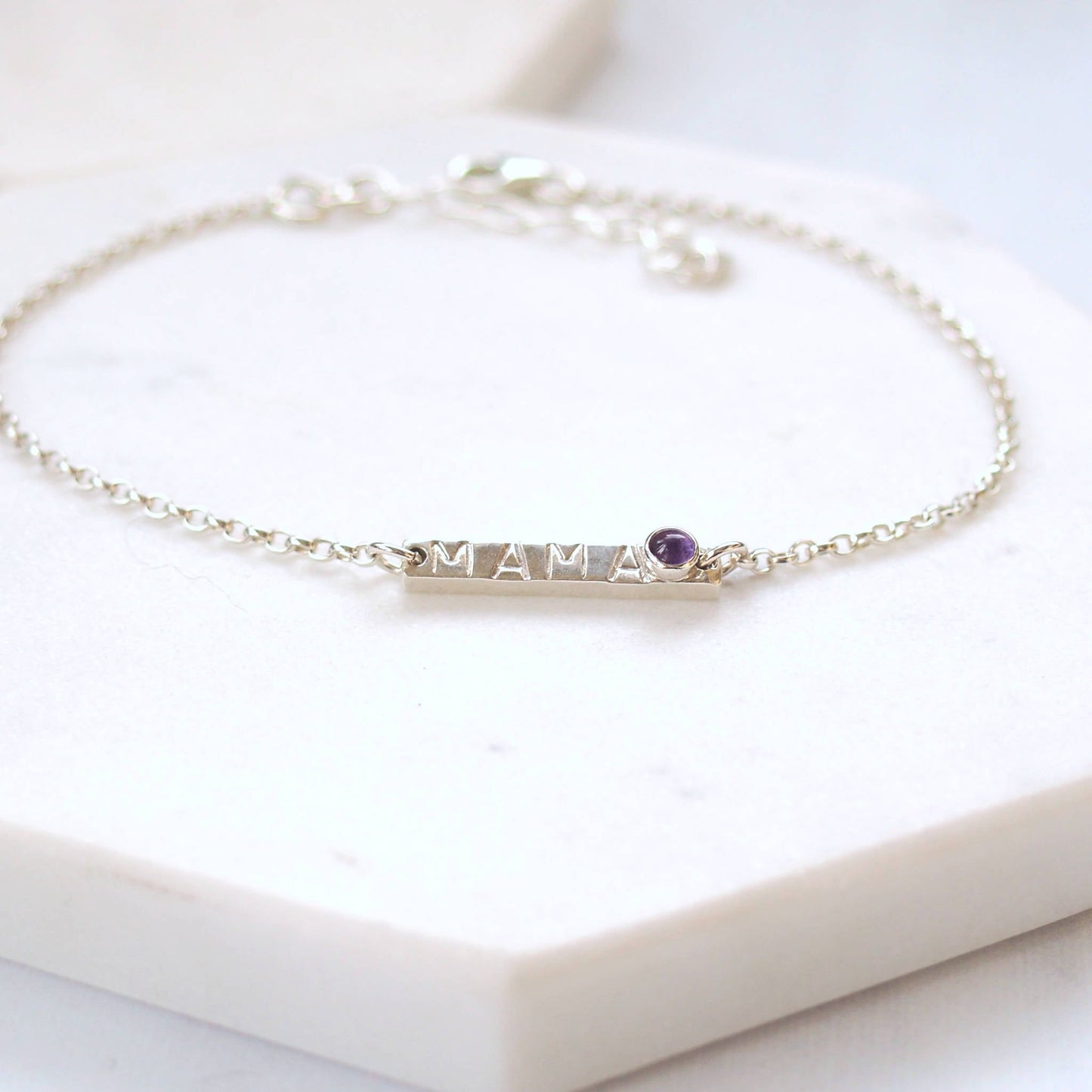 Silver Bar bracelet with hand stamped MAMA with a baby birthstone in February Amethyst. Handmade by maram jewellery in Scotland UK