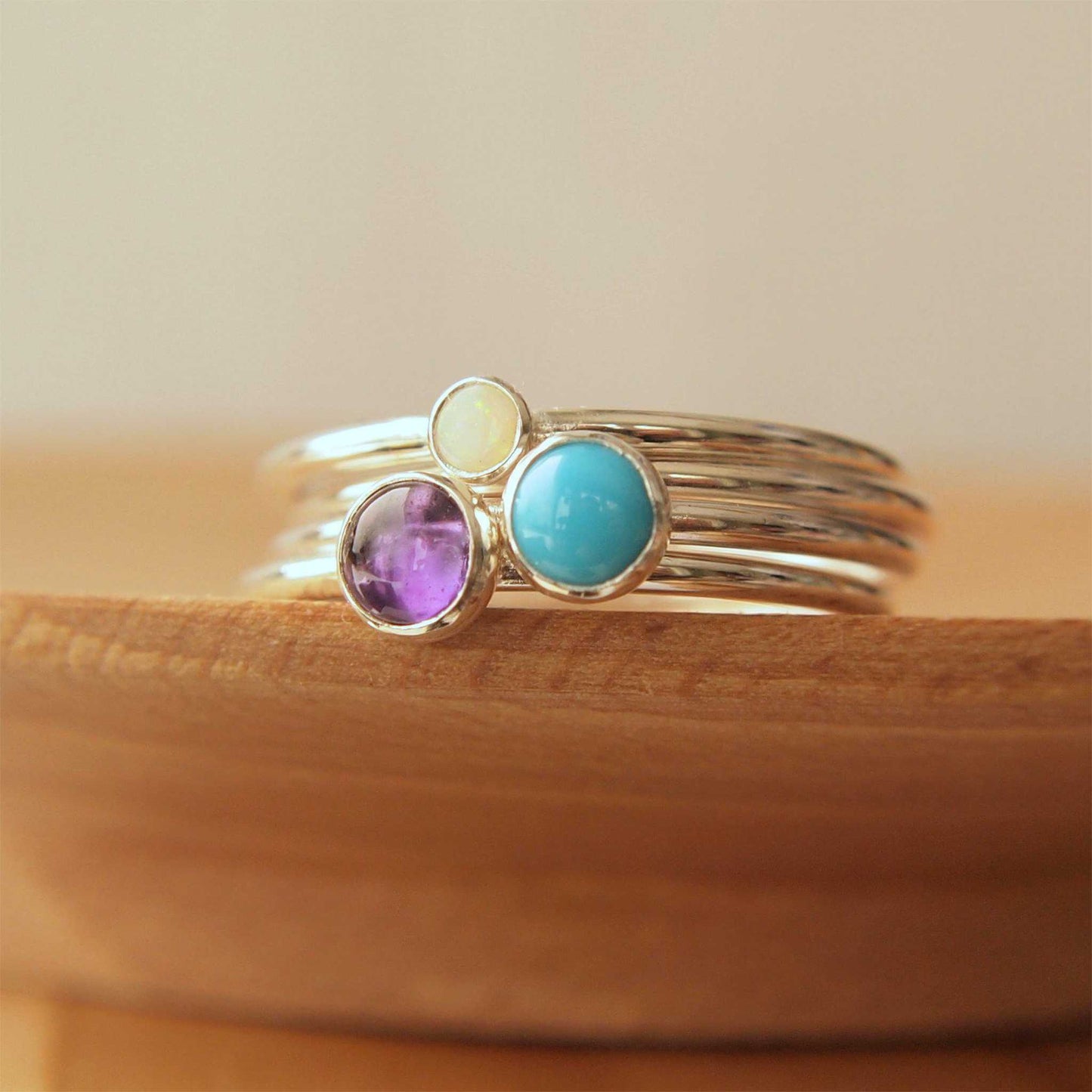 Family Birthstone Ring set with Amethyst, Turquoise and Opal in Sterling Silver. Handmade in Scotland by maram jewellery