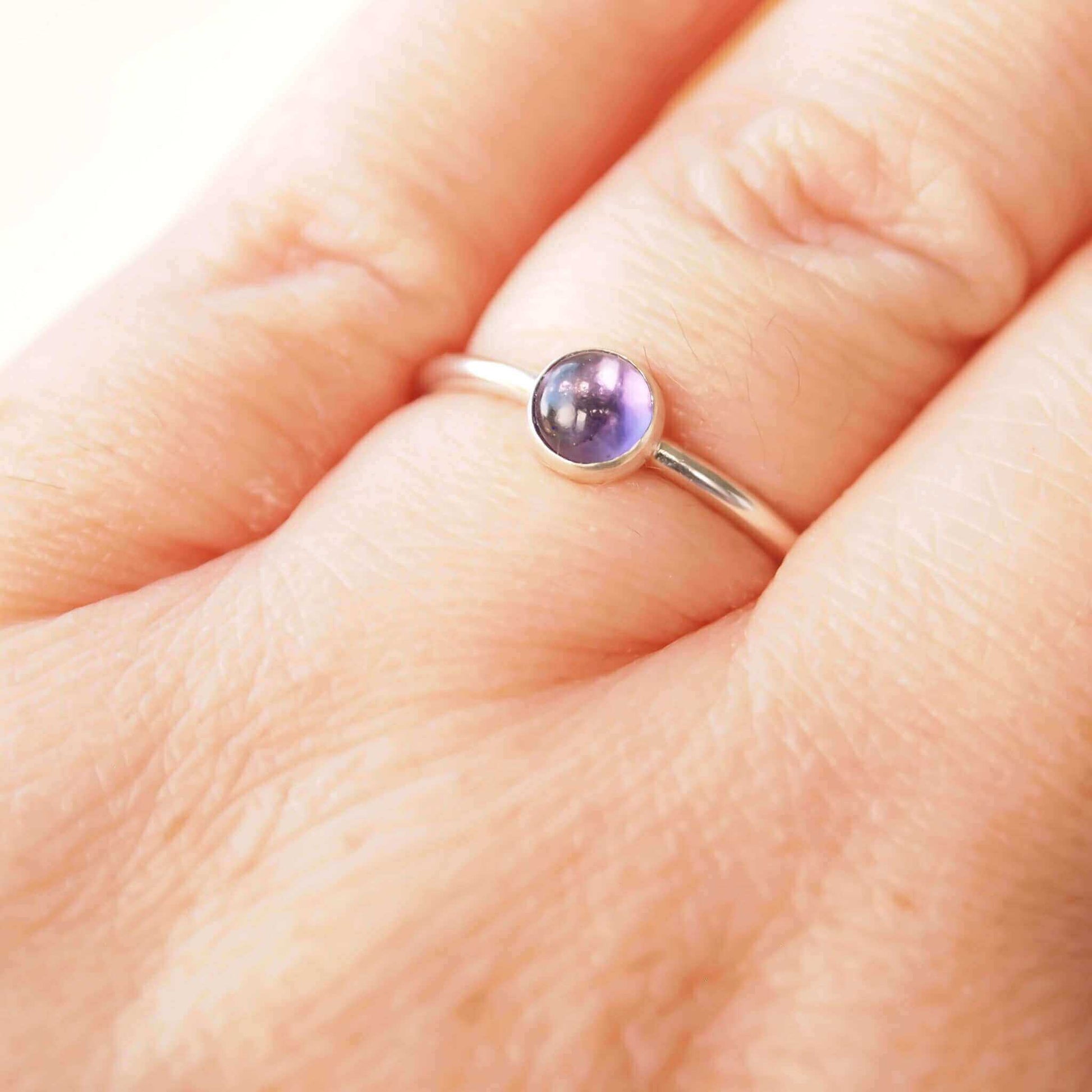 Simple Silver and Amethyst ring with a round 5mm Purple Amethyst, February's Birthstone. Handmade by Maram Jewellery in Scotland
