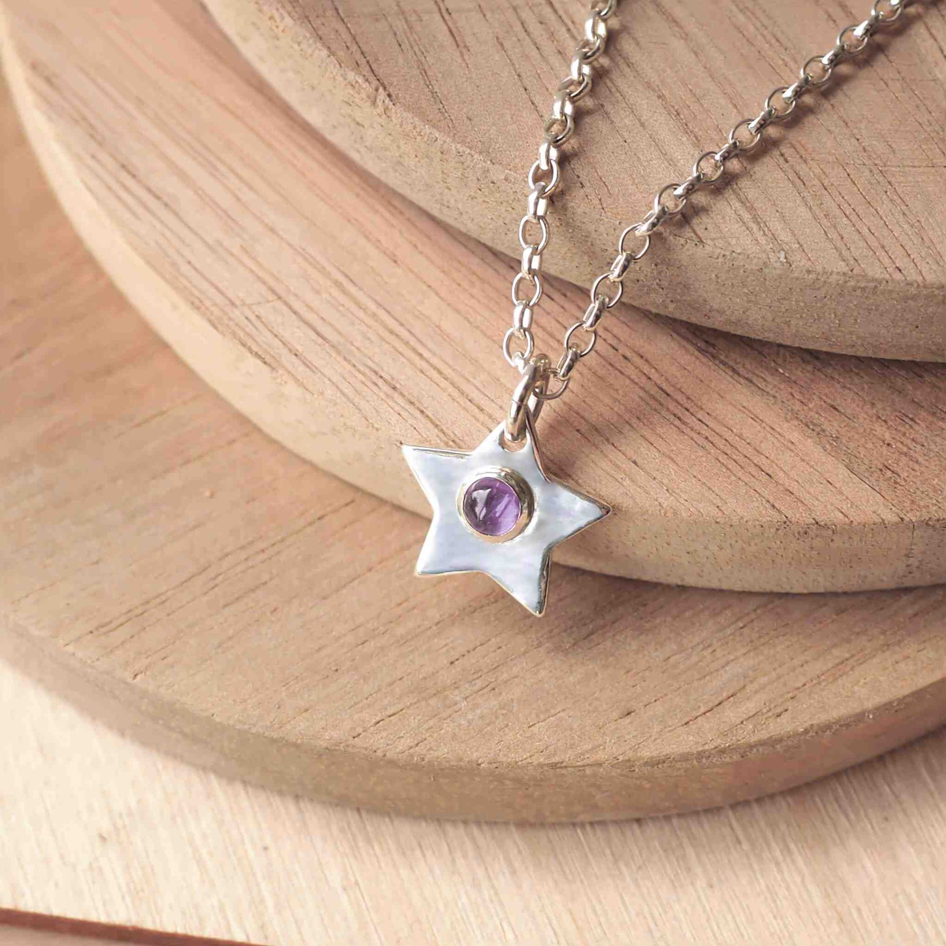 Sterling Silver Birthstone necklace with a gem in the centre. this one is purple Amethyst for February and other birthstones are available. Handmade in Scotland UK