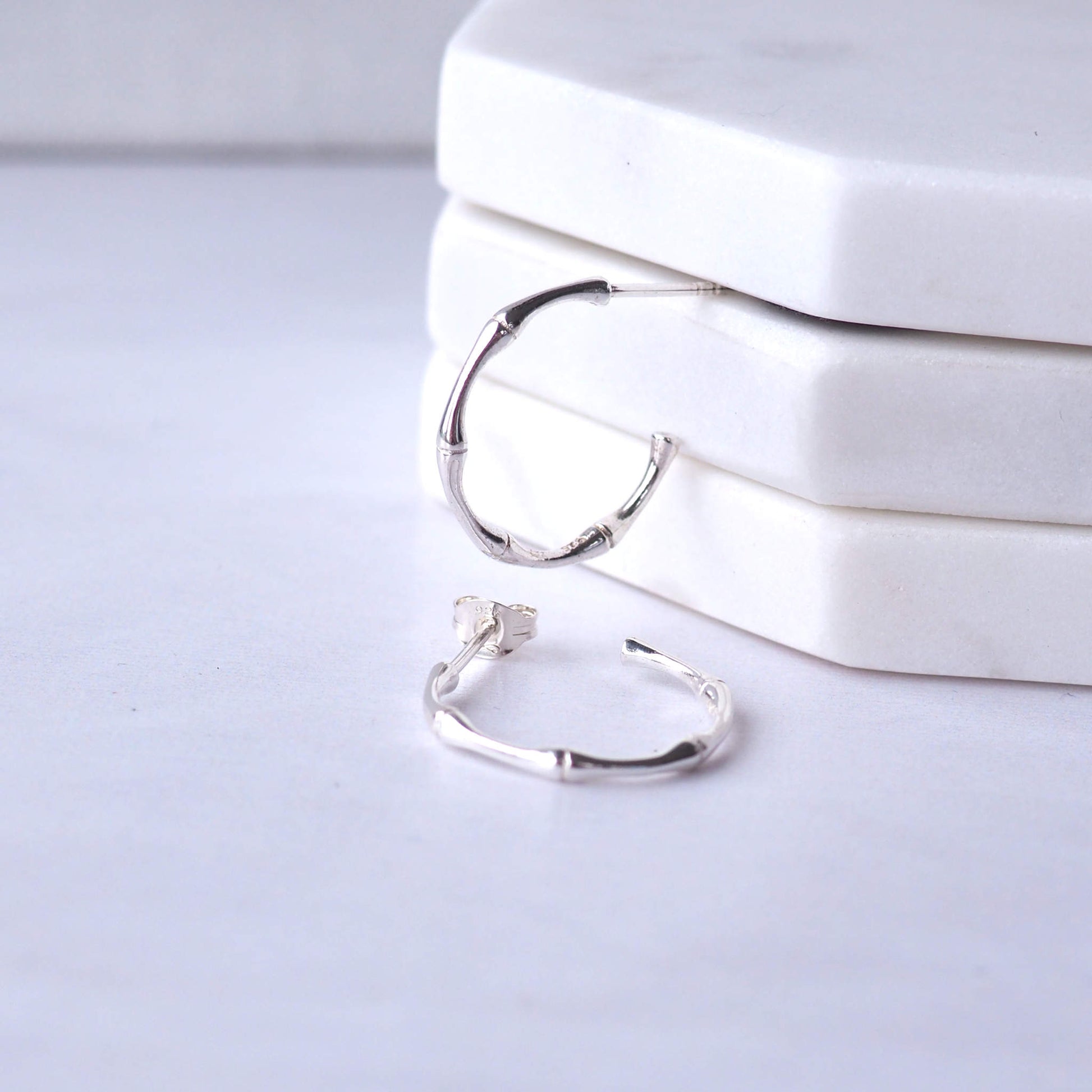 Silver Nature inspired Hoop Earrings with a bamboo texture . Shipped by maram jewellery in Scotland UK