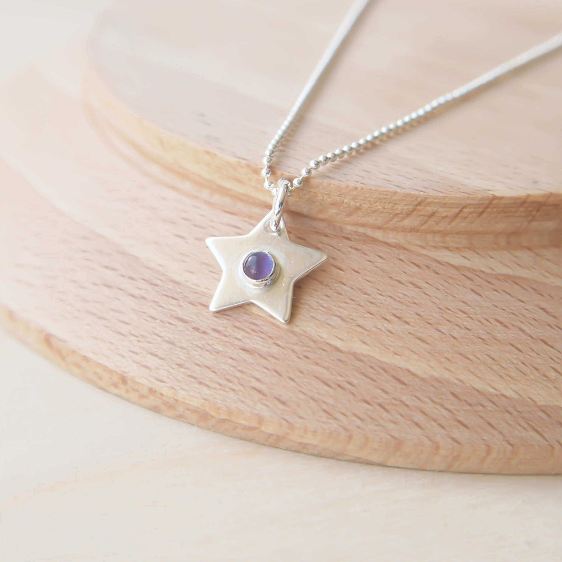 Sterling Silver Birthstone necklace with a gem in the centre. this one is purple Amethyst for February and other birthstones are available. Handmade in Scotland UK
