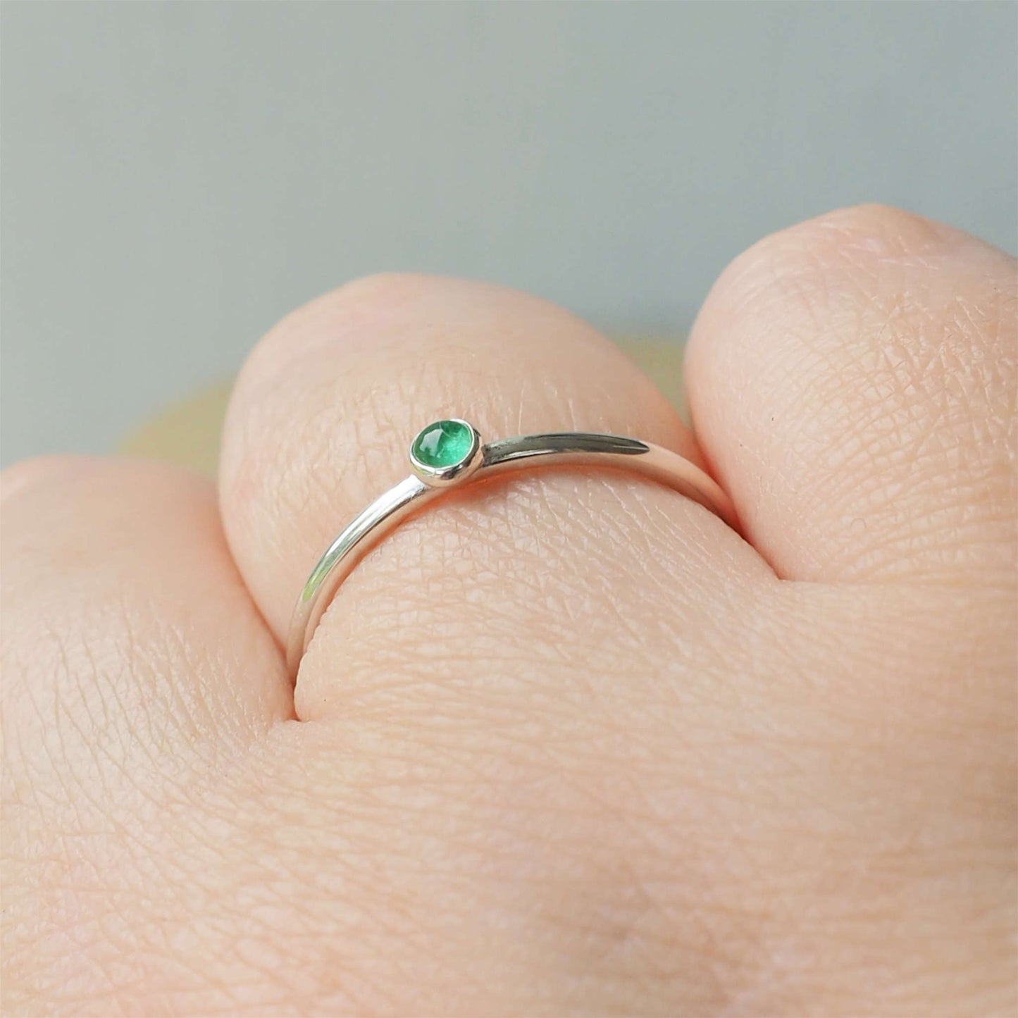 Emerald and Sterling Silver Gemstone ring with a round 3mm cabochon in Emerald, Birthstone for May. Handmade in Scotland by maram jewellery