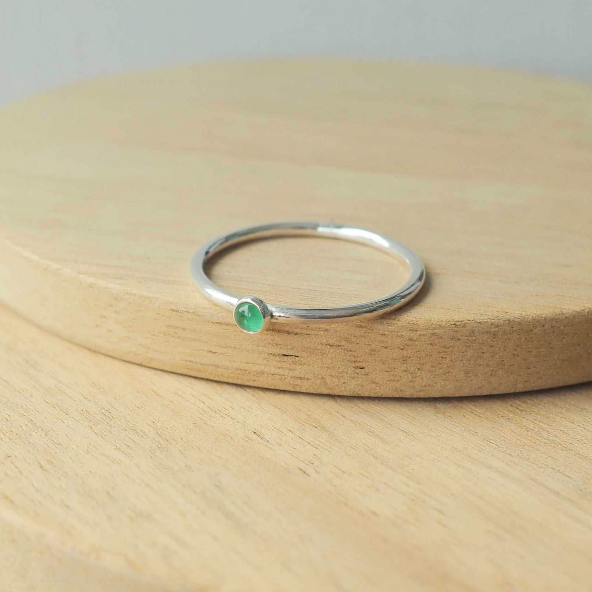 Emerald and Sterling Silver Gemstone ring with a round 3mm cabochon in Emerald, Birthstone for May. Handmade in Scotland by maram jewellery