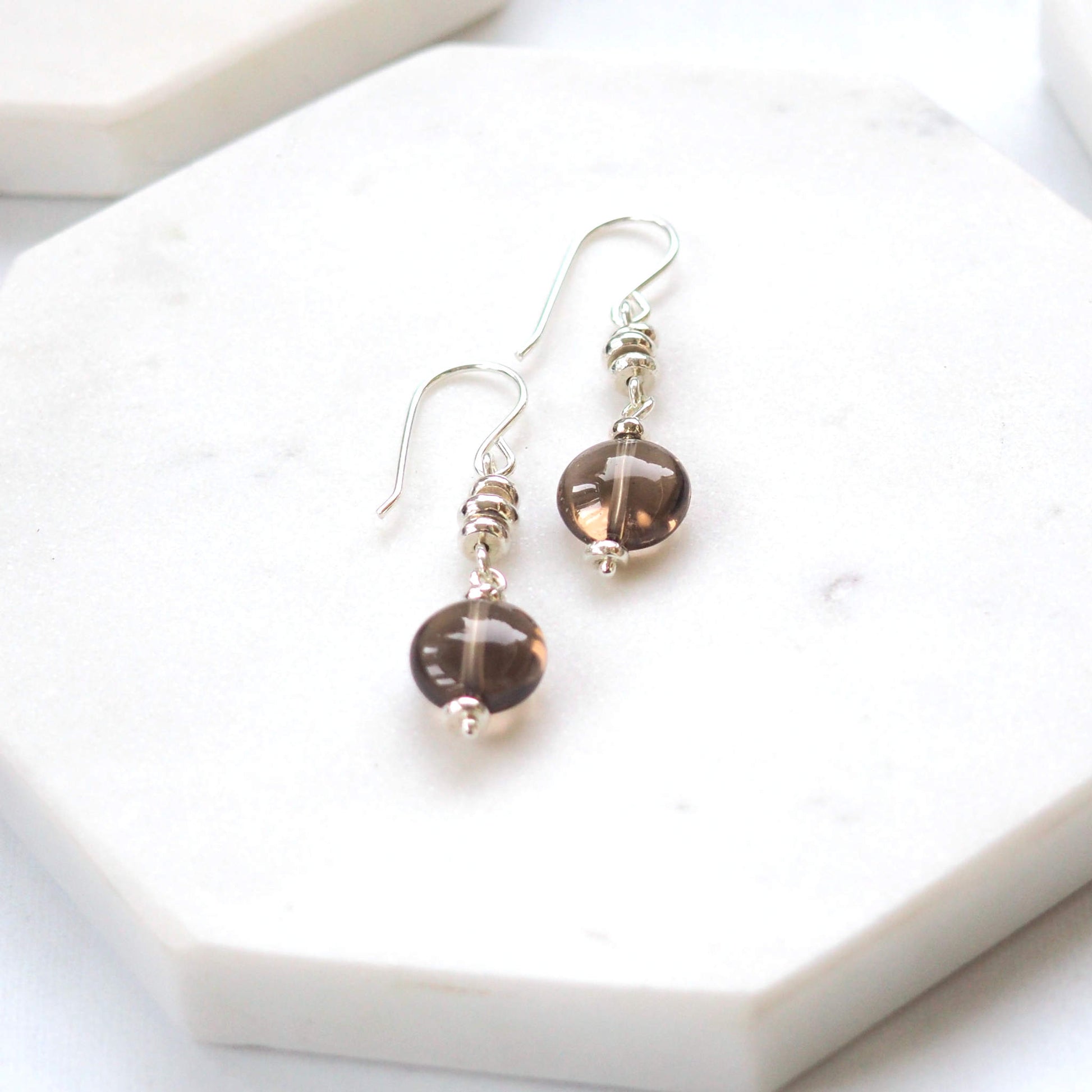 Smoky Quartz and Sterling Silver dropper earrings. made from recycled silver beads and a 1cm round smoky quartz drop. Made in Scotland by maram jewellery