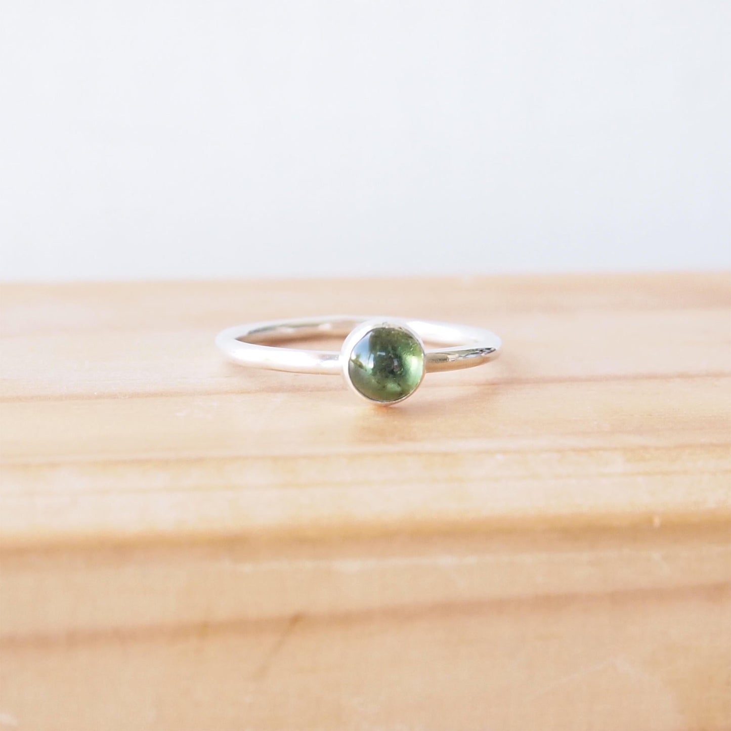 Green tourmaline ring with a 5mm moss green gemstone. Handmade in Scotland by maram jewellery