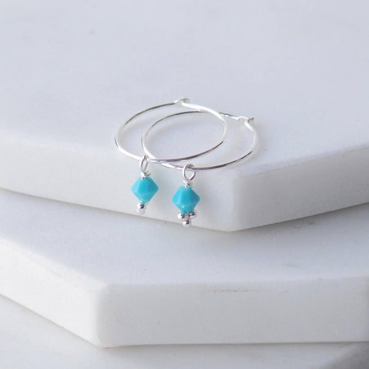 Birthstone Hoops with December Turquoise Crystal droppers. Simple boho style for all ages. Made in Scotland by maram jewellery
