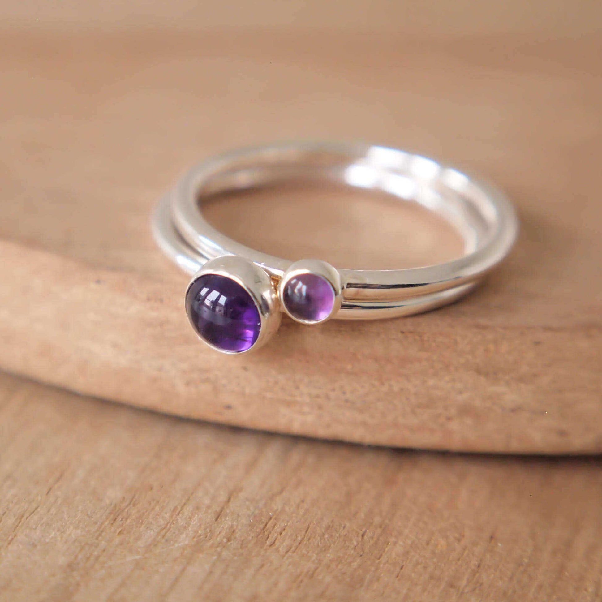 Purple amethyst and silver two ring set in Sterling silver with 5mm and 3mm round cabochon gemstones. Handmade in Edinburgh by maram jewellery