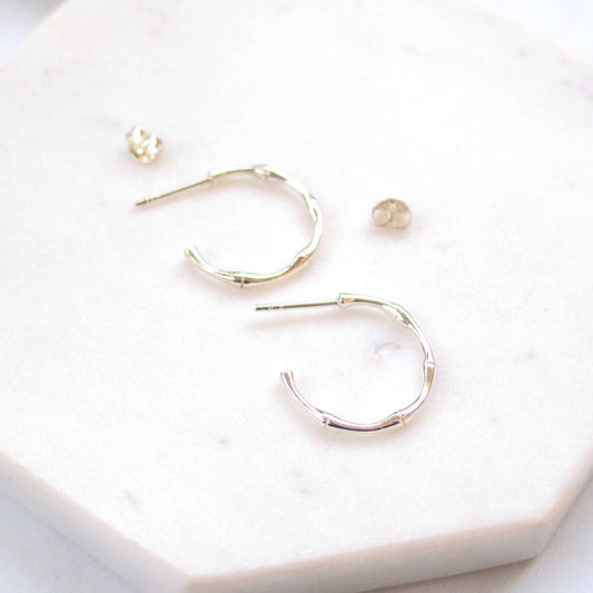 Silver Nature inspired Hoop Earrings with a bamboo texture . Shipped by maram jewellery in Scotland UK