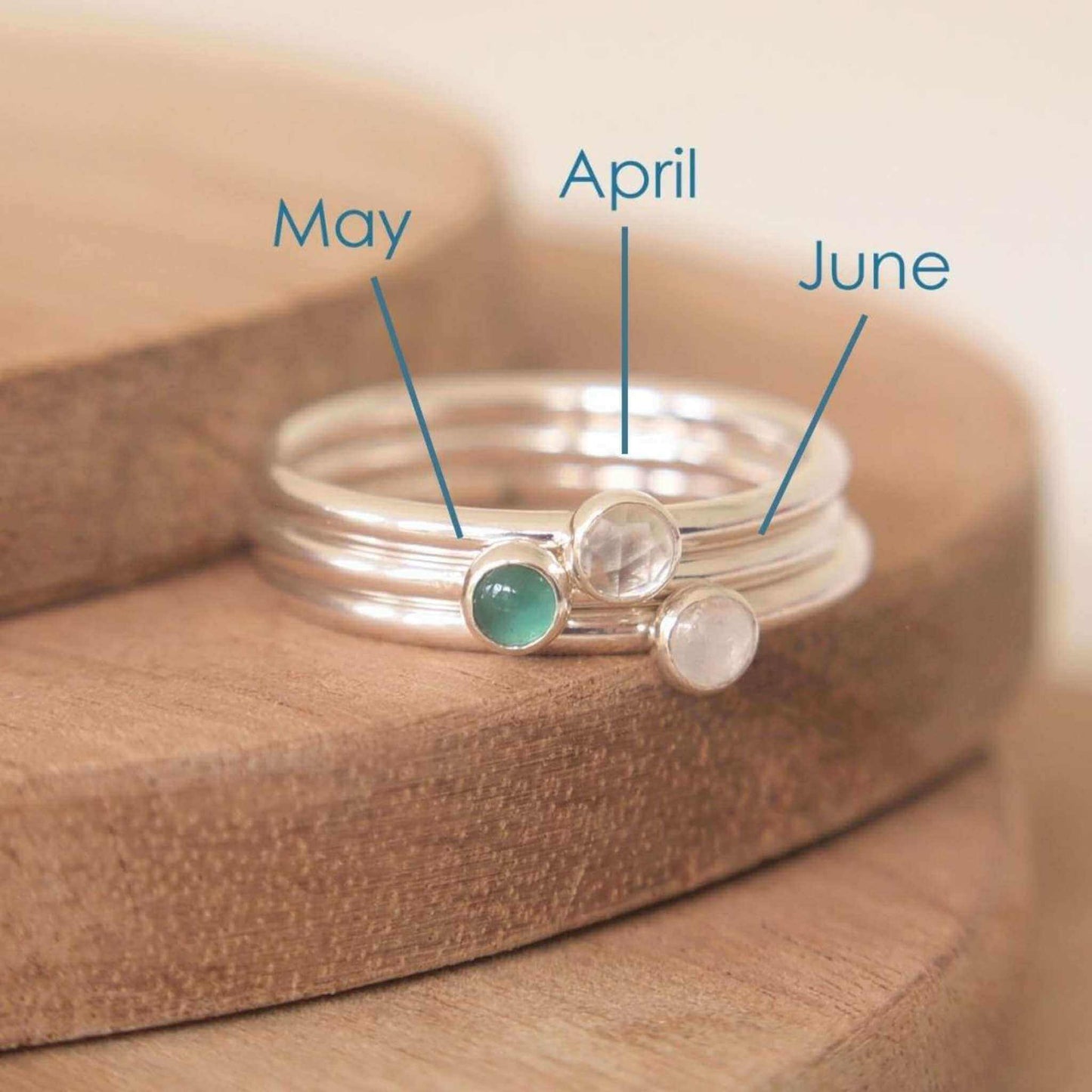 Three Silver rings, each set simply with a single gemstone in Green Agate, White Topaz and Moonstone in a round 3mm size. Birthstones for April, May and June. Handmade in Scotland by Maram Jewellery