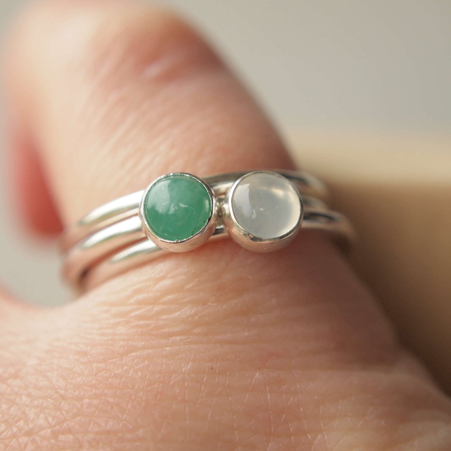 Birthstone ring set with Emerald and Moonstone in Sterling Silver. Handmade in Scotland by maram jewellery