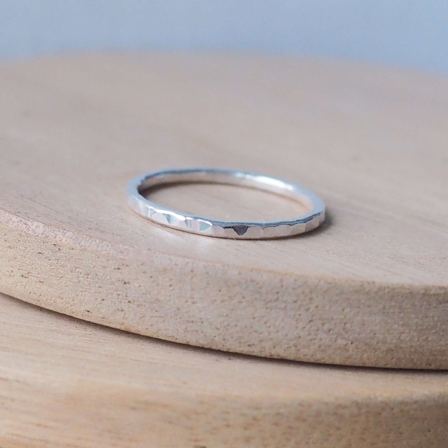 Hammered finish silver ring ideal for stacking or wearing on its own. perfect simple jewellery made from round wire with a gently hammered texture. Handmade in Scotland by maram jewellery