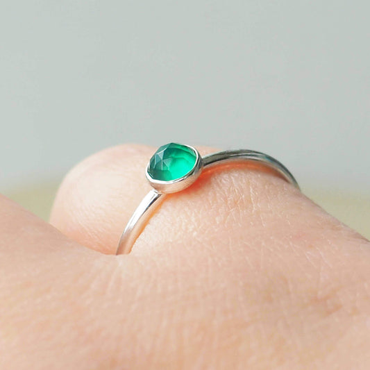 Green Agate Facet Cut Ring. A 5mm round cabochon emerald Green Agate, birthstone for May set very simply onto a round band of sterling silver. handmade by maram jewellery in Scotland