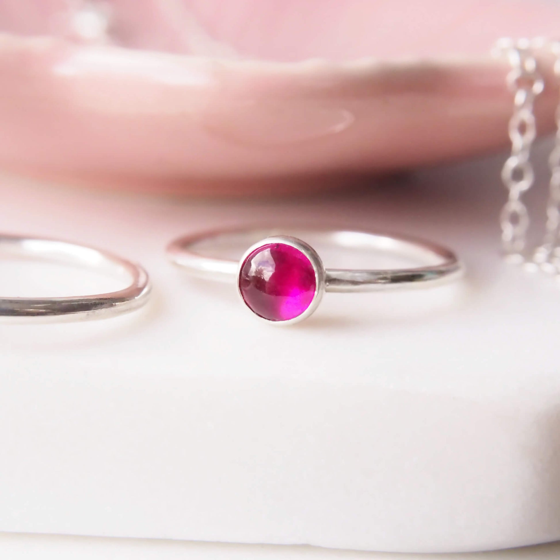 Ruby Birthstone Ring for July Birthday. A simple Lab Ruby round gemstone solitaire ring made with Sterling Silver and a manmade ruby. Handmade to your ring size by maram jewellery in the UK