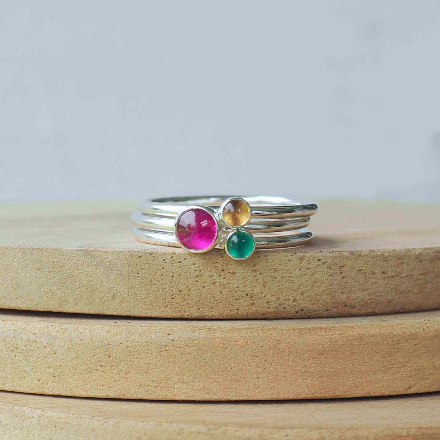 Three ring birthstone ring set made from sterling silver and three gemstones. This set has Lab Ruby, Citrine and Green Agate to mark July, November and May Birthstones.  Handmade in Scotland by Maram Jewellery