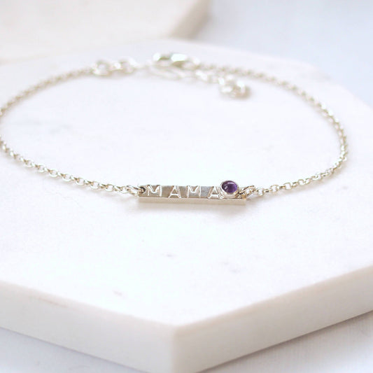 Silver Bar bracelet with hand stamped MAMA with a baby birthstone in February Amethyst. Handmade by maram jewellery in Scotland UK