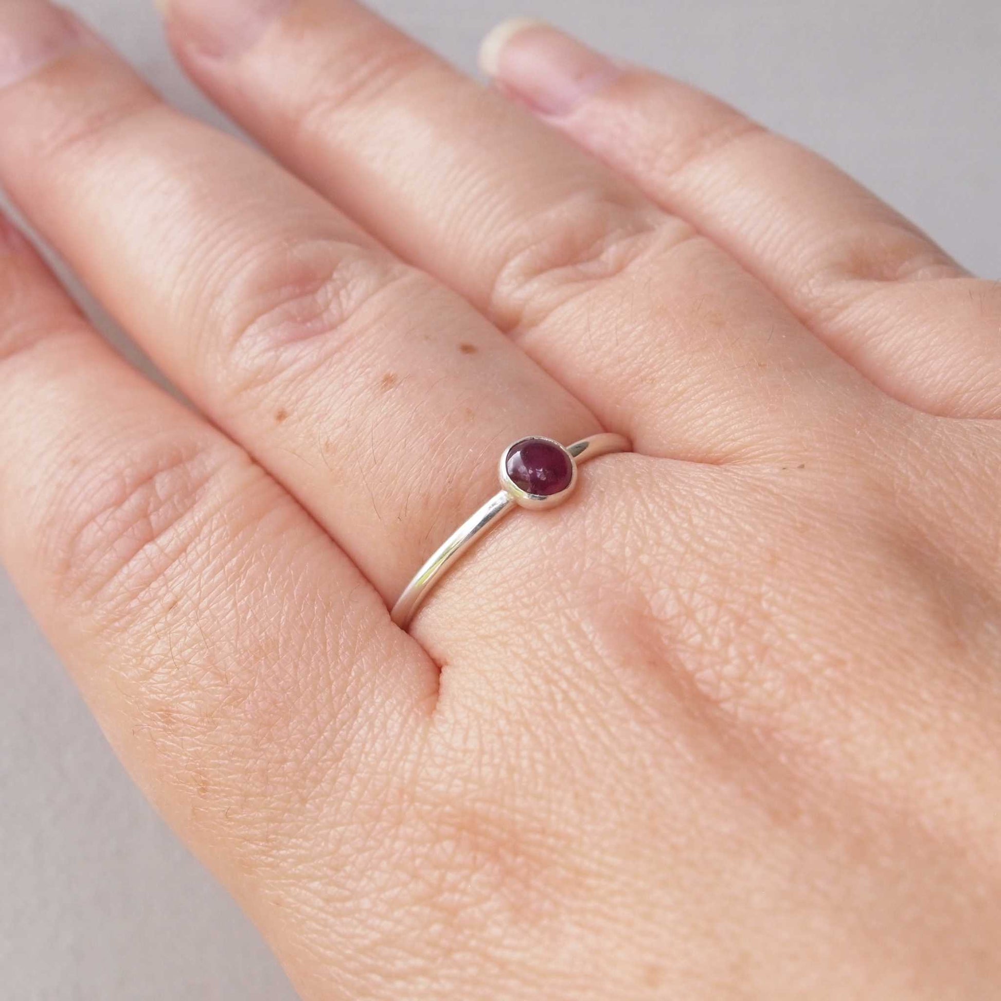 Solitaire Ruby ring in Silver and natural Ruby. A modern minimalist ring made to measure to your ring size by maram jewellery in the UK
