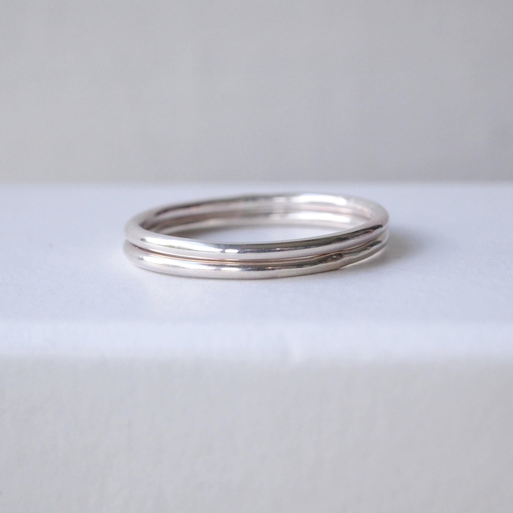 Two Plain round profile wedding plain band with no details. minimalist sterling Silver ring. Handmade to your ring size by maram jewellery in Edinburgh UK