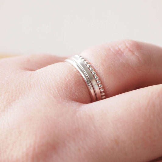 three textured plain band rings with round, square and bubble bands. Handmade in Scotland by maram jewellery