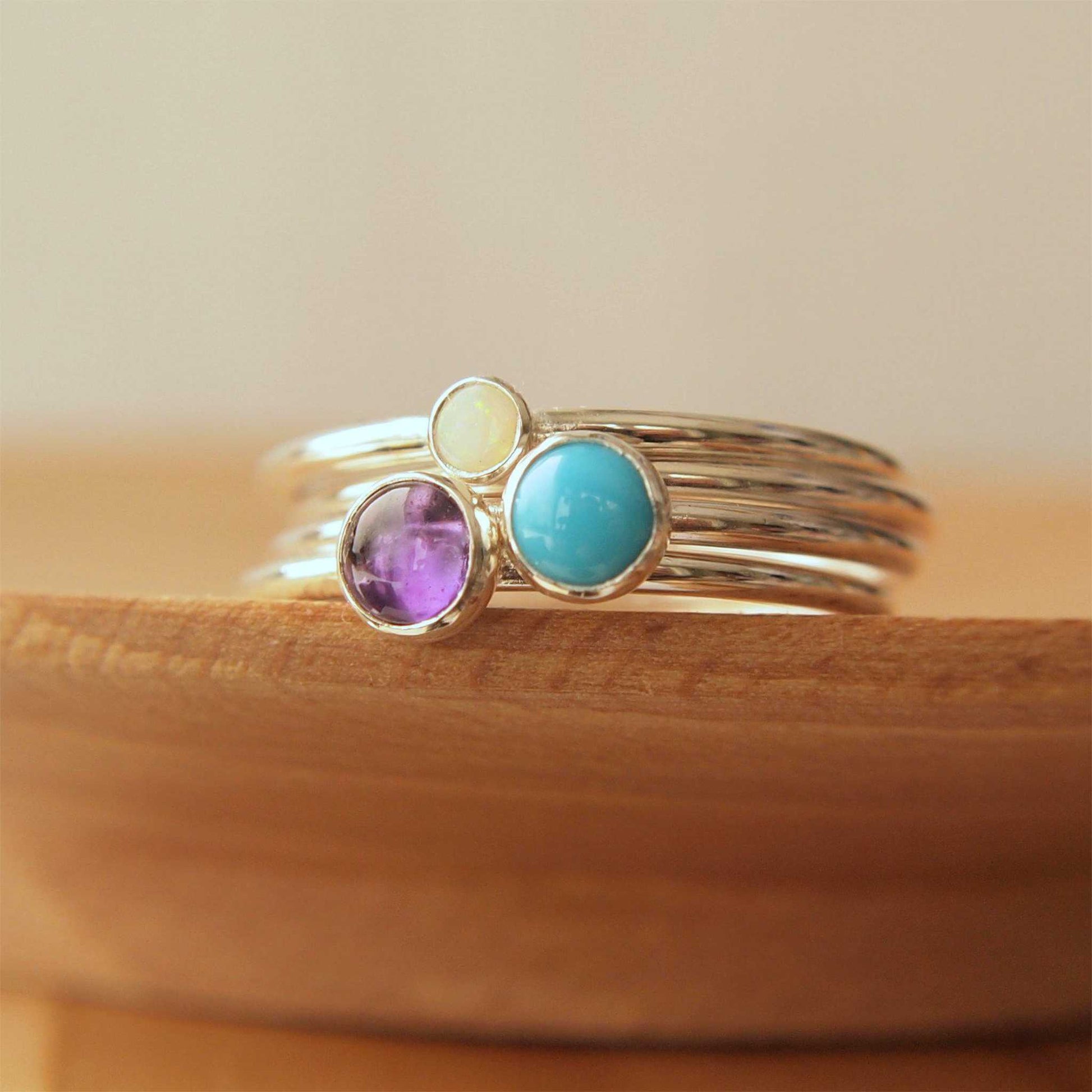 Family Birthstone Ring set with Amethyst, Turquoise and Opal in Sterling Silver. Handmade in Scotland by maram jewellery